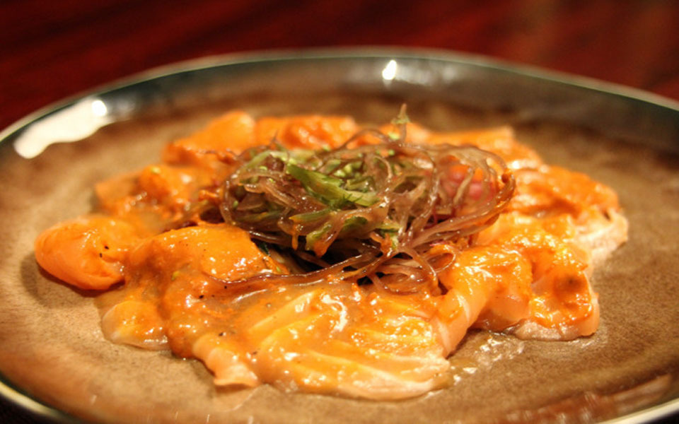 Salmon sashimi with coriander, stuffed Peppers and honey sauce